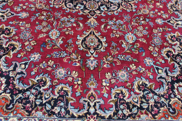 SIGNED PERSIAN KERMAN RUG WITH A FINE FLORAL DESIGN 325 X 225 CM