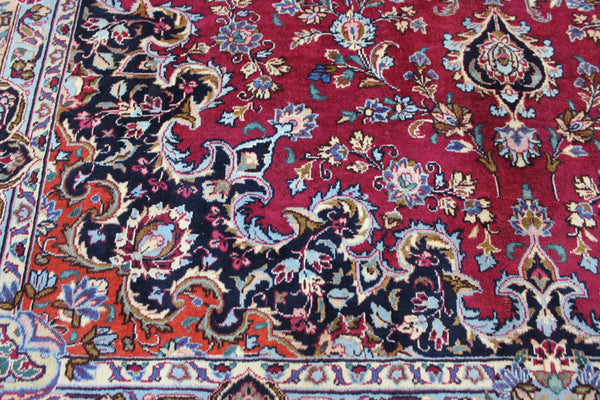 SIGNED PERSIAN KERMAN RUG WITH A FINE FLORAL DESIGN 325 X 225 CM