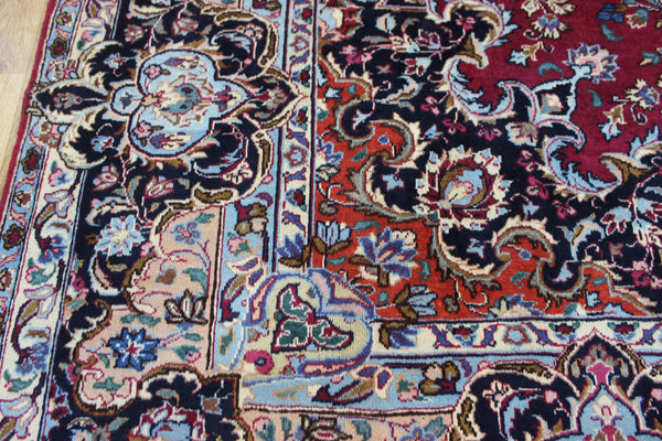 SIGNED PERSIAN KERMAN RUG WITH A FINE FLORAL DESIGN 325 X 225 CM