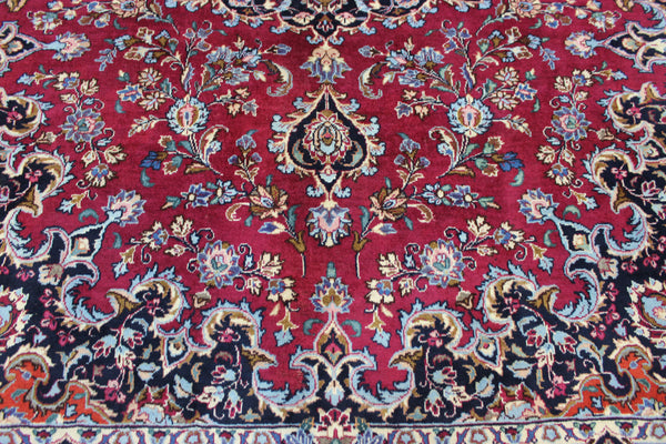 SIGNED PERSIAN KERMAN RUG WITH A FINE FLORAL DESIGN 325 X 225 CM