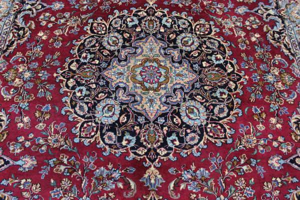 SIGNED PERSIAN KERMAN RUG WITH A FINE FLORAL DESIGN 325 X 225 CM