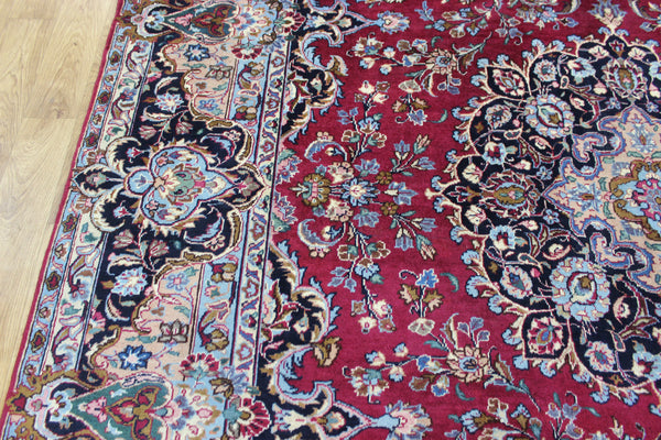 SIGNED PERSIAN KERMAN RUG WITH A FINE FLORAL DESIGN 325 X 225 CM