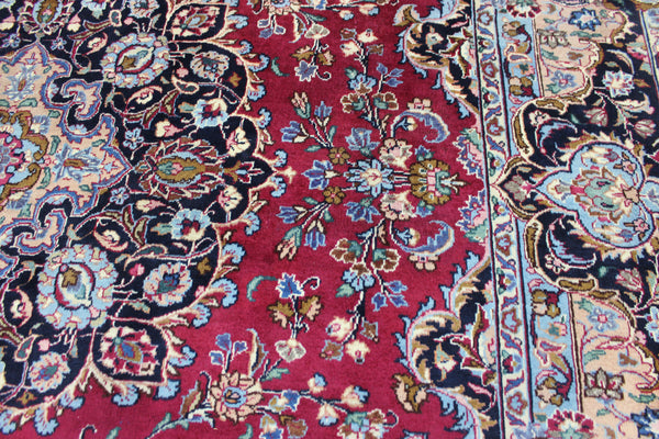 SIGNED PERSIAN KERMAN RUG WITH A FINE FLORAL DESIGN 325 X 225 CM