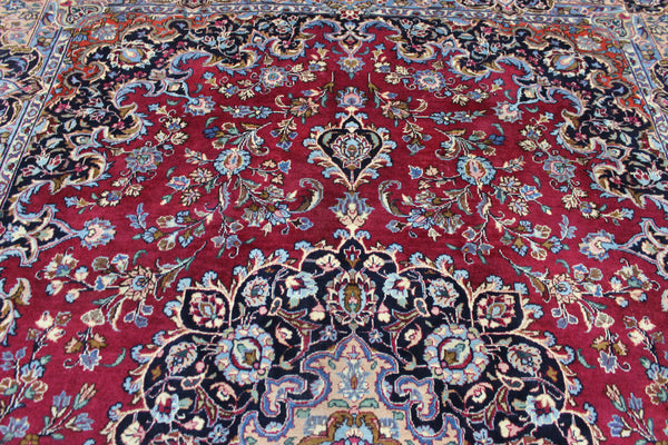 SIGNED PERSIAN KERMAN RUG WITH A FINE FLORAL DESIGN 325 X 225 CM