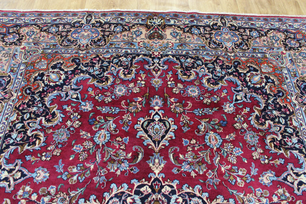 SIGNED PERSIAN KERMAN RUG WITH A FINE FLORAL DESIGN 325 X 225 CM