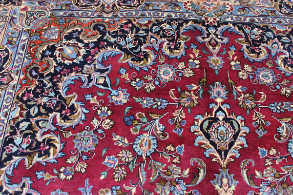 SIGNED PERSIAN KERMAN RUG WITH A FINE FLORAL DESIGN 325 X 225 CM