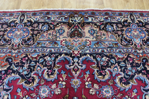 SIGNED PERSIAN KERMAN RUG WITH A FINE FLORAL DESIGN 325 X 225 CM