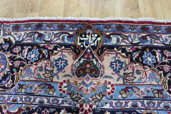 SIGNED PERSIAN KERMAN RUG WITH A FINE FLORAL DESIGN 325 X 225 CM