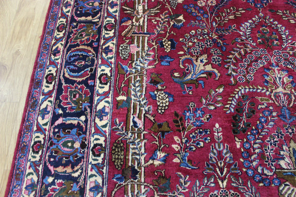 SIGNED PERSIAN MASHAD RUG WITH A GARDEN DESIGN 290 X 200 CM