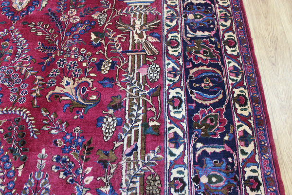 SIGNED PERSIAN MASHAD RUG WITH A GARDEN DESIGN 290 X 200 CM
