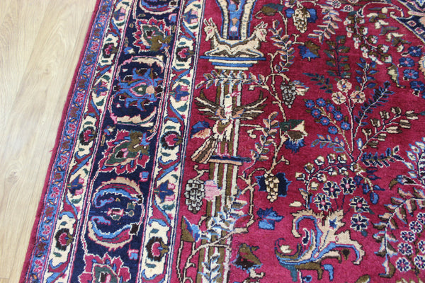 SIGNED PERSIAN MASHAD RUG WITH A GARDEN DESIGN 290 X 200 CM