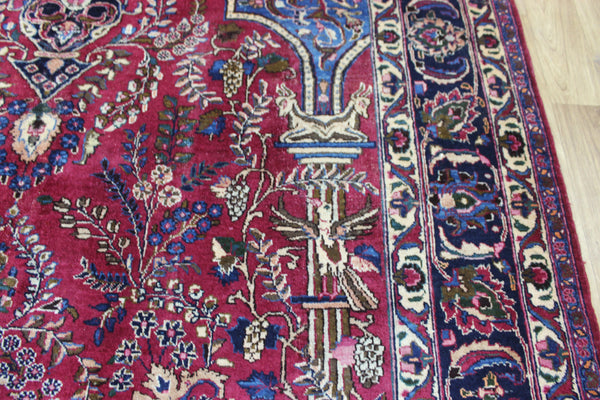 SIGNED PERSIAN MASHAD RUG WITH A GARDEN DESIGN 290 X 200 CM
