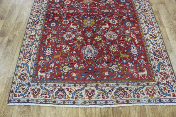 Vintage handmade Persian rug with a very pleasing floral, birds and animals design 205 x 140 cm