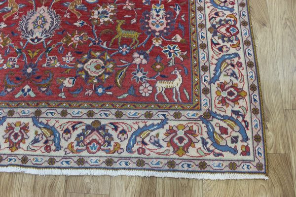 Vintage handmade Persian rug with a very pleasing floral, birds and animals design 205 x 140 cm