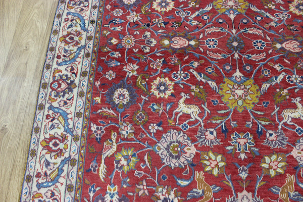 Vintage handmade Persian rug with a very pleasing floral, birds and animals design 205 x 140 cm