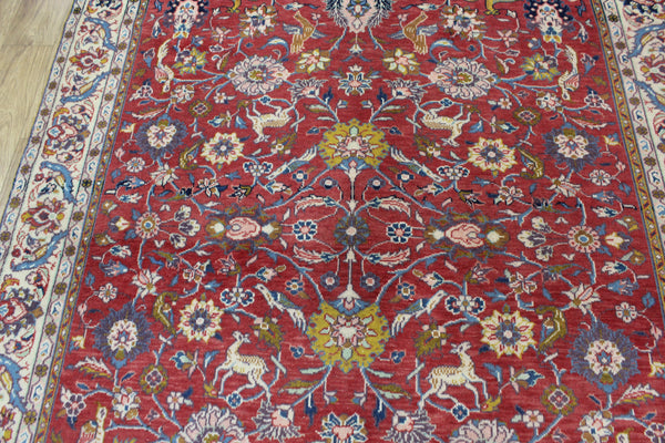 Vintage handmade Persian rug with a very pleasing floral, birds and animals design 205 x 140 cm