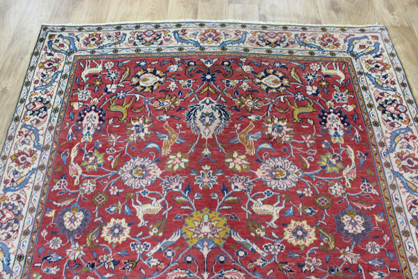 Vintage handmade Persian rug with a very pleasing floral, birds and animals design 205 x 140 cm