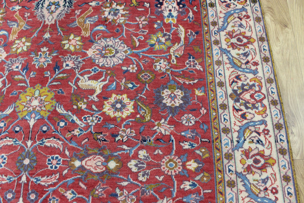 Vintage handmade Persian rug with a very pleasing floral, birds and animals design 205 x 140 cm