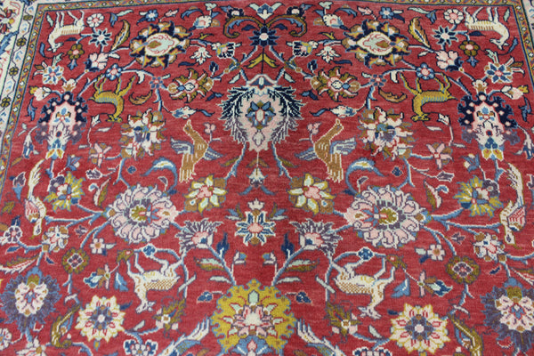Vintage handmade Persian rug with a very pleasing floral, birds and animals design 205 x 140 cm