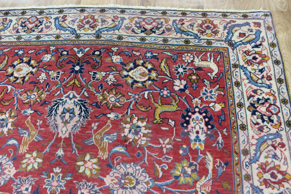 Vintage handmade Persian rug with a very pleasing floral, birds and animals design 205 x 140 cm