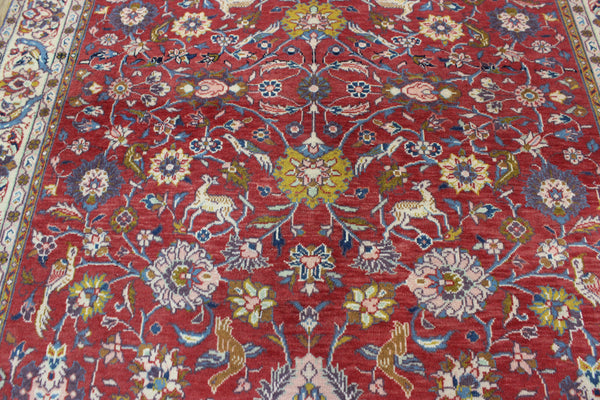 Vintage handmade Persian rug with a very pleasing floral, birds and animals design 205 x 140 cm