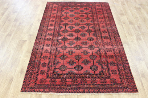 Vintage handmade Turkmen wool rug of traditional gul design 190 x 127 cm