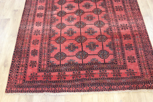 Vintage handmade Turkmen wool rug of traditional gul design 190 x 127 cm