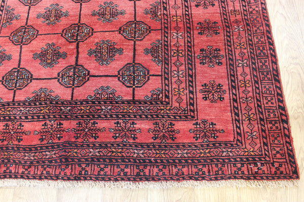 Vintage handmade Turkmen wool rug of traditional gul design 190 x 127 cm