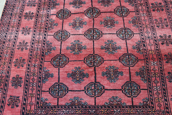 Vintage handmade Turkmen wool rug of traditional gul design 190 x 127 cm