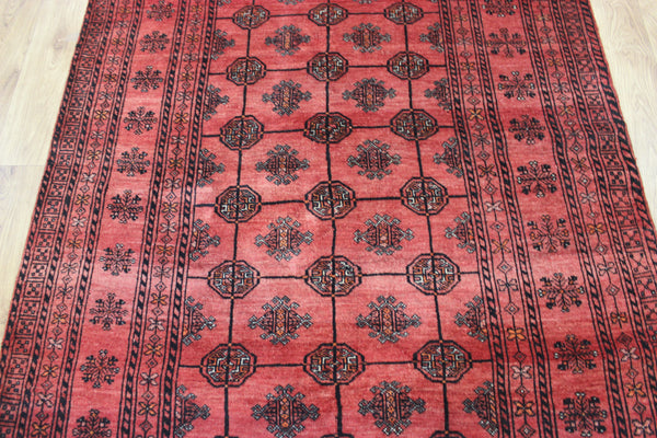 Vintage handmade Turkmen wool rug of traditional gul design 190 x 127 cm