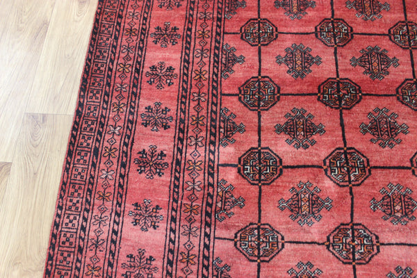 Vintage handmade Turkmen wool rug of traditional gul design 190 x 127 cm