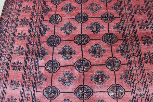 Vintage handmade Turkmen wool rug of traditional gul design 190 x 127 cm