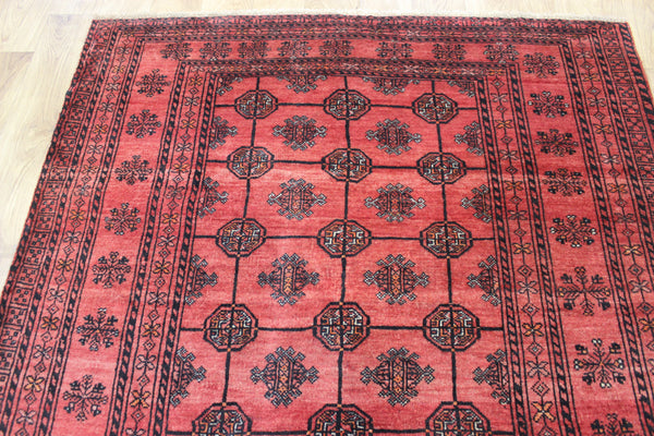 Vintage handmade Turkmen wool rug of traditional gul design 190 x 127 cm