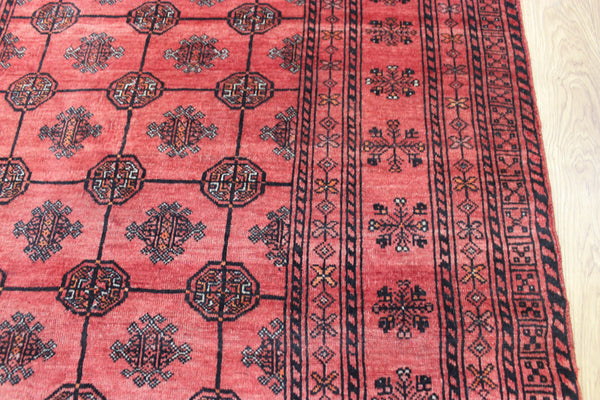 Vintage handmade Turkmen wool rug of traditional gul design 190 x 127 cm