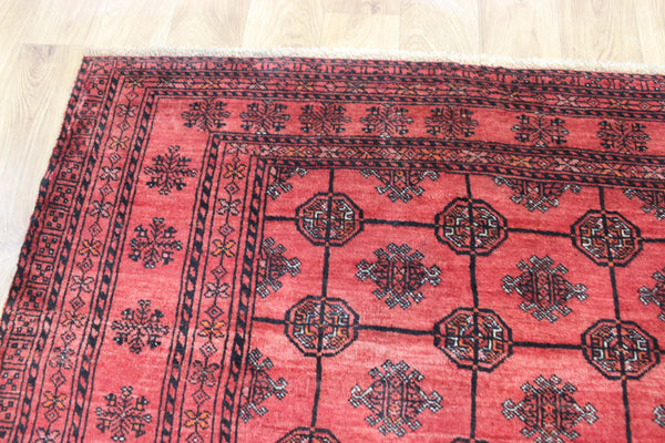 Vintage handmade Turkmen wool rug of traditional gul design 190 x 127 cm