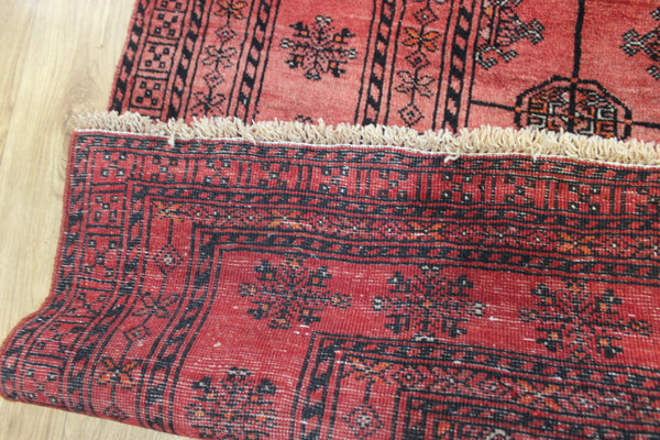 Vintage handmade Turkmen wool rug of traditional gul design 190 x 127 cm