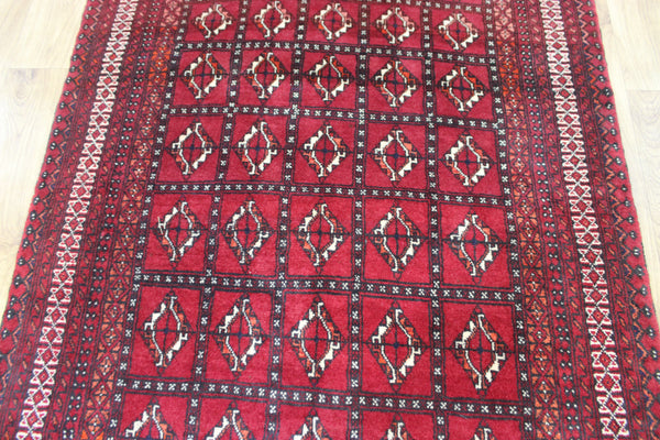 Fine handmade Persian Turkmen wool rug of traditional gul design 165 x 100 cm