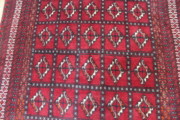 Fine handmade Persian Turkmen wool rug of traditional gul design 165 x 100 cm