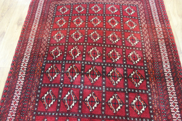 Fine handmade Persian Turkmen wool rug of traditional gul design 165 x 100 cm
