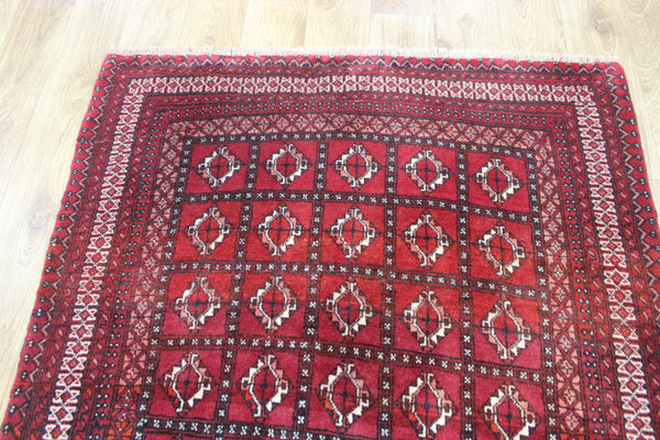 Fine handmade Persian Turkmen wool rug of traditional gul design 165 x 100 cm