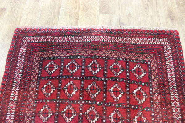 Fine handmade Persian Turkmen wool rug of traditional gul design 165 x 100 cm