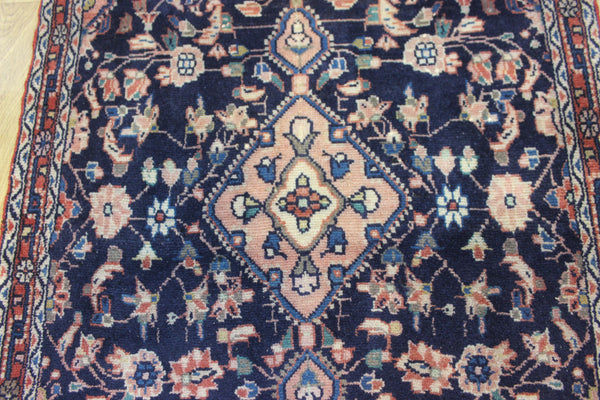 Large handmade Persian wool runner of traditional floral design 340 x 97 cm