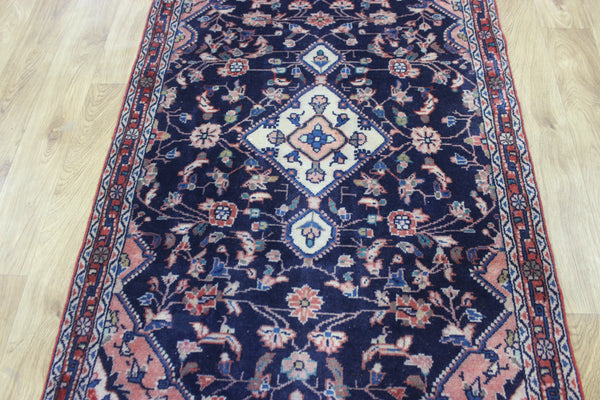 Large handmade Persian wool runner of traditional floral design 340 x 97 cm