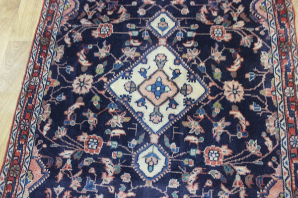 Large handmade Persian wool runner of traditional floral design 340 x 97 cm