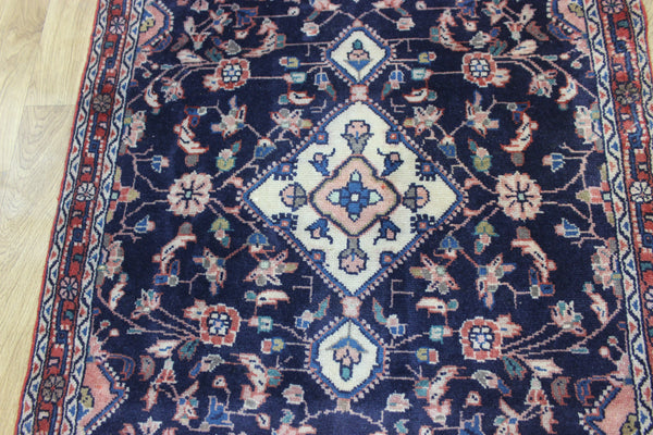 Large handmade Persian wool runner of traditional floral design 340 x 97 cm