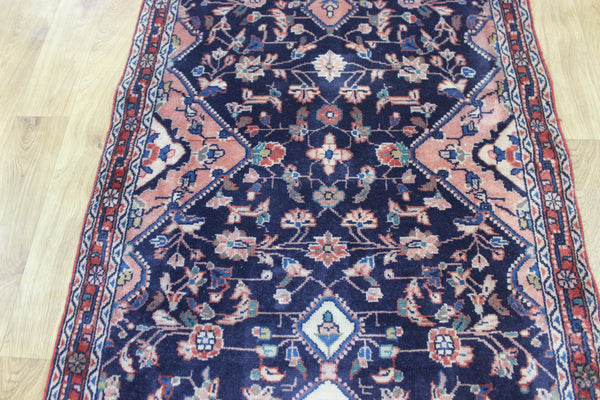 Large handmade Persian wool runner of traditional floral design 340 x 97 cm