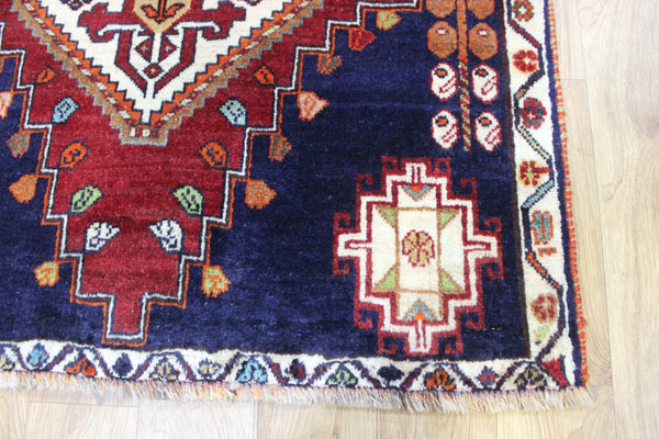 Vintage handmade Persian Shiraz wool rug of traditional medallion design 205 x 96 cm