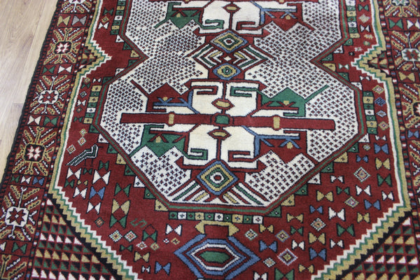 Fine handmade Persian Goochan rug of traditional medallion design