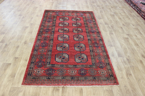 Vintage handmade Turkmen wool rug of traditional large gul design 217 x 126 cm