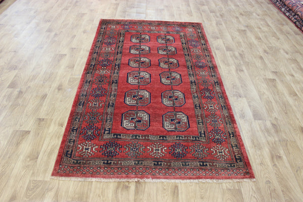 Vintage handmade Turkmen wool rug of traditional large gul design 217 x 126 cm